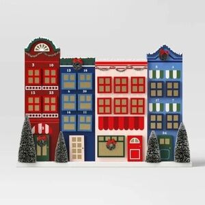 Festive Holiday Advent Calendar with Red and Blue Houses